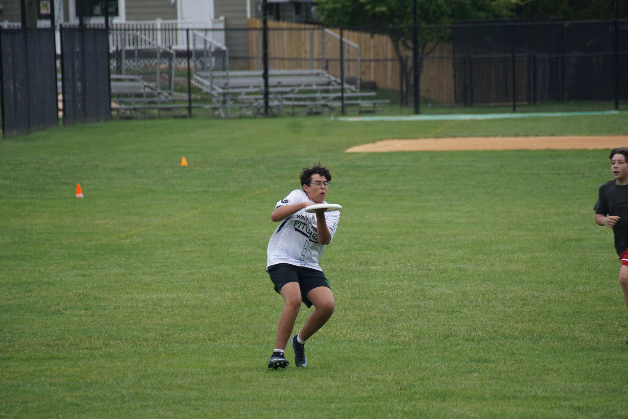 A Pitchers player catching the disc at a Walter Johnson game